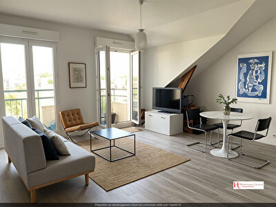 Appartement dernier étage avec balcon